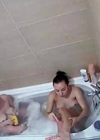 Two lesbian girls bathing