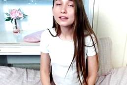 Long haired teen masturbating on webcam