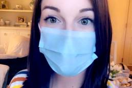 Sexy brunette wearing a mask